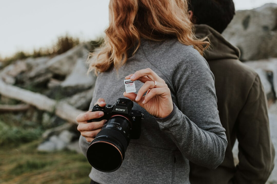 Photographer and brand representative collaborating on a shoot
