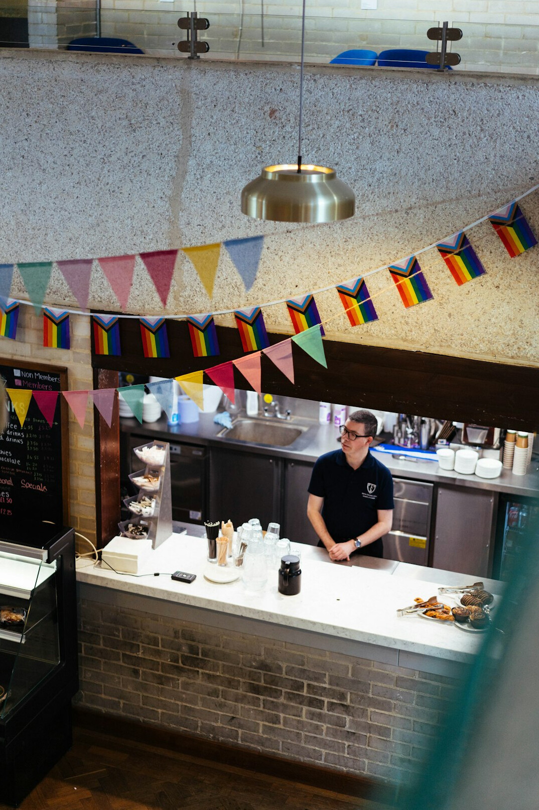 Barista preparing coffee in a neighborhood café